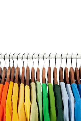colored shirts hanging up