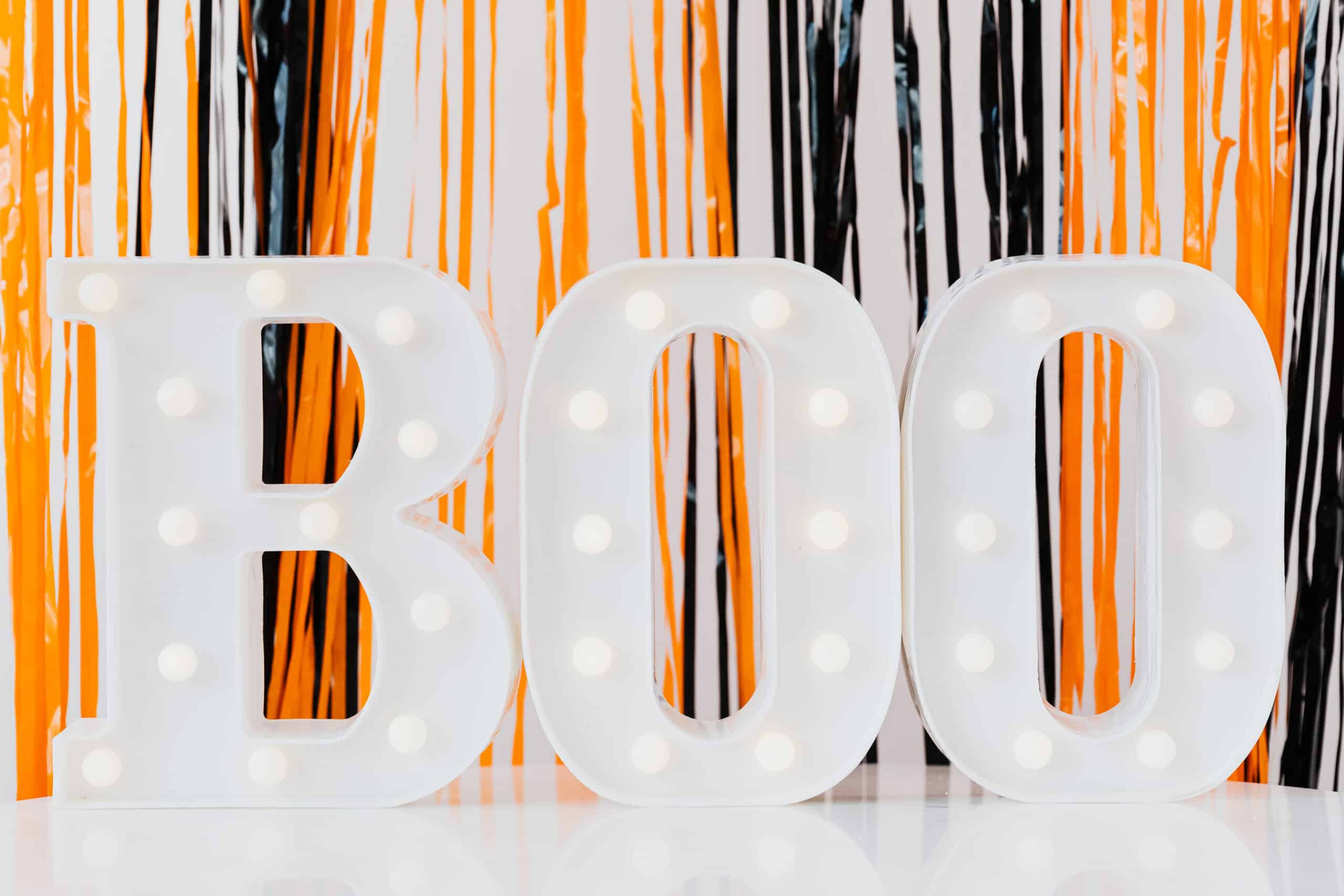 Boo! with black and orange streamers